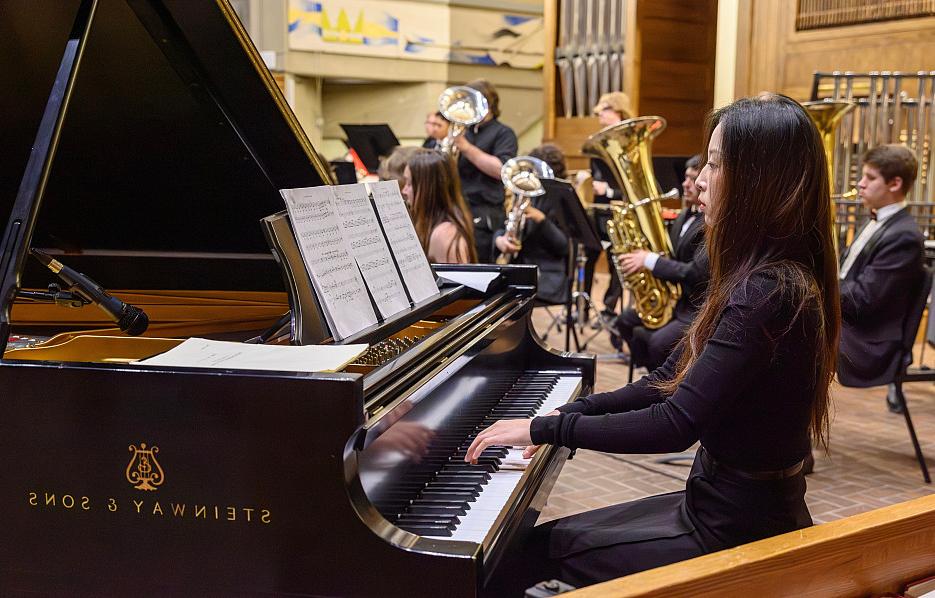 Student playing the piano