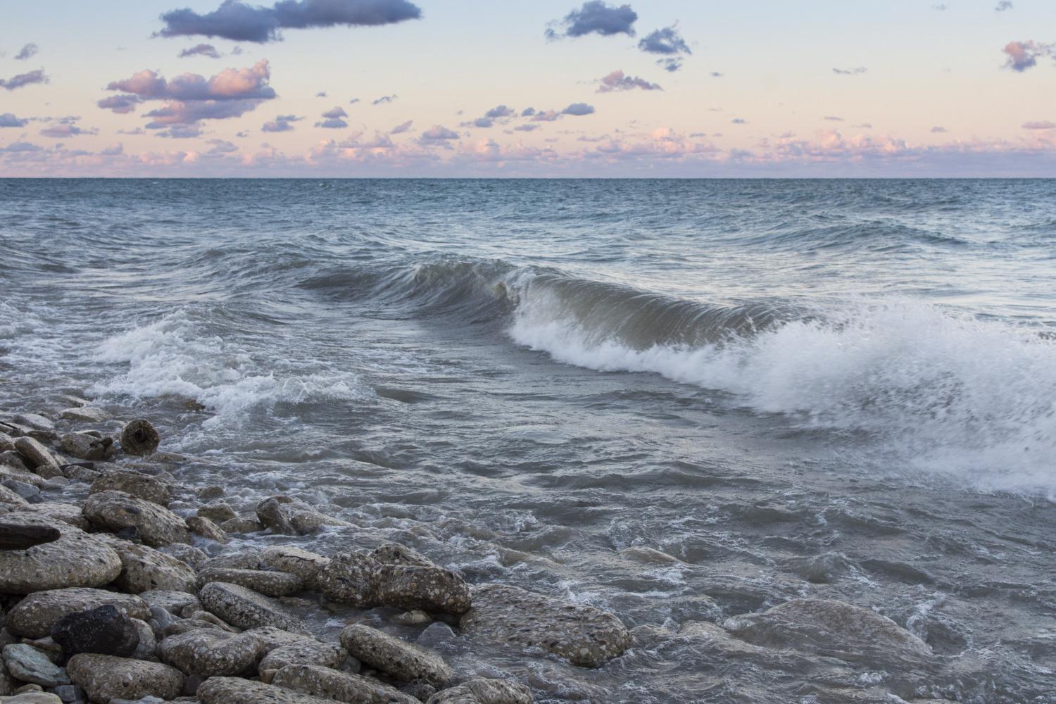 The sun rises over Lake Michigan on the Carthage College campus.